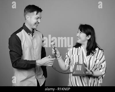 Portrait of young businessman et mature Asian businesswoman Banque D'Images