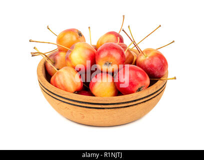 Paradise apples in bol en bois sur fond blanc Banque D'Images