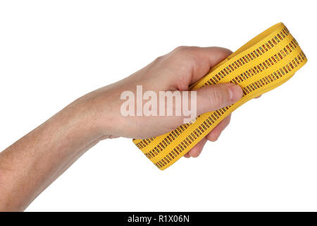 L'homme tient dans sa main une toile jaune harnais sangle. Gros plan studio isolated on white Banque D'Images