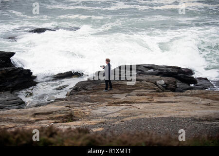 La pêche au large de l'arrêt de phare de Castor à Jamestown Rhode Island Banque D'Images