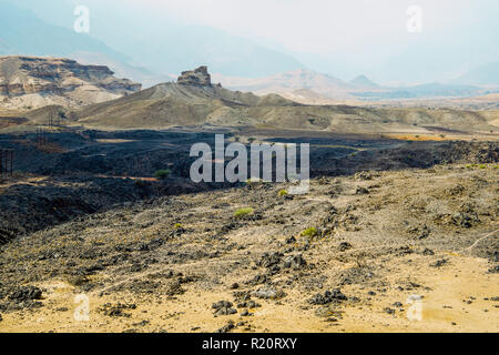 Paysage lunaire autour de village Al Ya, Oman. Banque D'Images