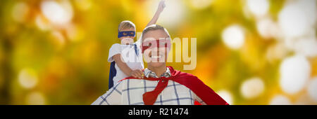 Image composite de la mère et le fils pastry pie Banque D'Images