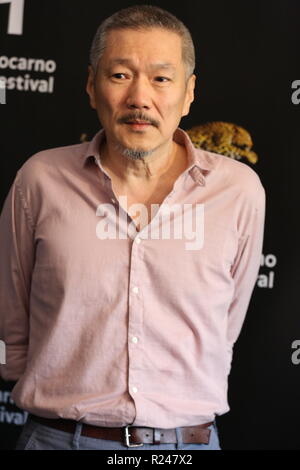 LOCARNO, SUISSE - Aug 09, 2018 : Hong Sang-soo assiste à l' Hôtel "Gangbyun photocall au 71e Festival du Film de Locarno (Photo : Mickael Chavet) Banque D'Images