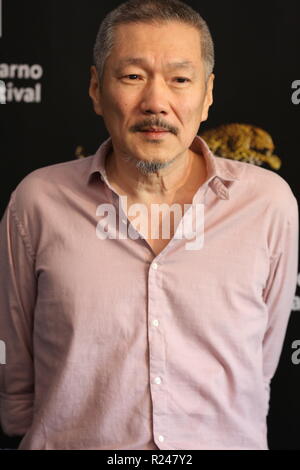 LOCARNO, SUISSE - Aug 09, 2018 : Hong Sang-soo assiste à l' Hôtel "Gangbyun photocall au 71e Festival du Film de Locarno (Photo : Mickael Chavet) Banque D'Images