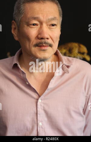 LOCARNO, SUISSE - Aug 09, 2018 : Hong Sang-soo assiste à l' Hôtel "Gangbyun photocall au 71e Festival du Film de Locarno (Photo : Mickael Chavet) Banque D'Images