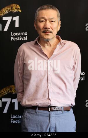 LOCARNO, SUISSE - Aug 09, 2018 : Hong Sang-soo assiste à l' Hôtel "Gangbyun photocall au 71e Festival du Film de Locarno (Photo : Mickael Chavet) Banque D'Images