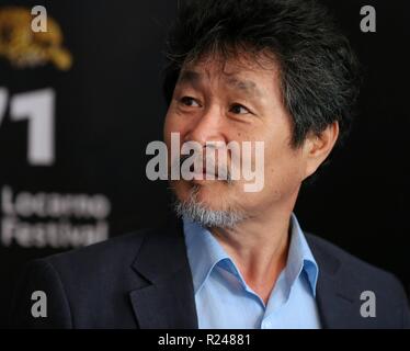 LOCARNO, SUISSE - Aug 09, 2018 : Ju-bong Gi assiste à l' Hôtel "Gangbyun photocall au cours de la 71e Festival du Film de Locarno (Photo : Mickael Chavet) Banque D'Images