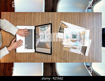 Haut Vue d'en haut sur l'architecte travaillant sur table en bois Banque D'Images
