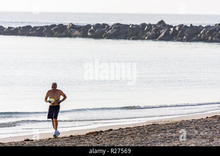 Miami Beach Florida,South Pointe SOFI,point,Atlantic Ocean Water public,plages,jetée,brise-lames,rochers,côte,sable,mer,homme hommes adulte annonce Banque D'Images