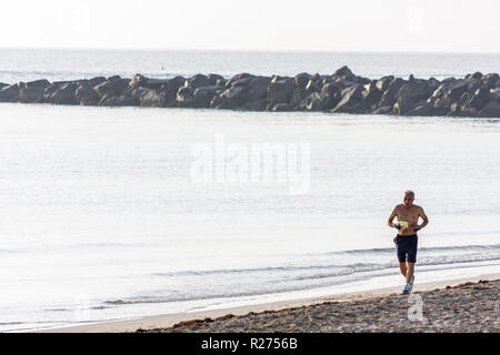 Miami Beach Florida,South Pointe SOFI,point,Atlantic Ocean Water public,plages,jetée,brise-lames,rochers,côte,sable,mer,homme hommes adulte annonce Banque D'Images