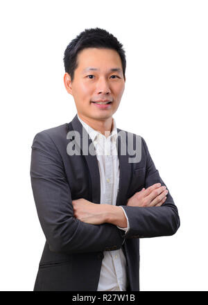 Portrait of young businessman en gardant les bras croisés Banque D'Images
