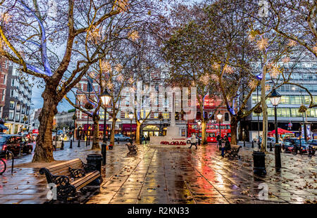 Les lumières de Noël dans la nuit de Sloane Square London UK Banque D'Images