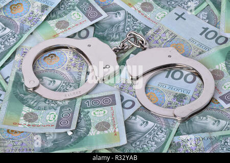 Hancuffs et billets en arrière-plan Banque D'Images