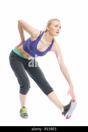 Fille blonde fait de la gymnastique Banque D'Images