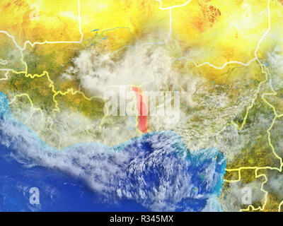Le Togo à partir de l'espace sur le modèle de la planète Terre avec des frontières du pays. Détails extrêmement précis de la surface de la planète et les nuages. 3D illustration. Éléments de cette i Banque D'Images