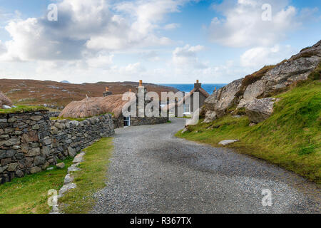 Chaume traditionnel crofts à Gearrannan Blackhouse Village à Carloway sur l'île de Lewis dans les Hébrides en Ecosse Banque D'Images