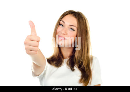 Young Girl showing thumb up isolé sur fond blanc Banque D'Images