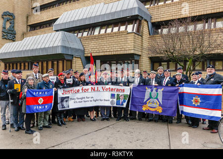 Glasgow, Ecosse, Royaume-Uni. 23 novembre, 2018. Dans le cadre d'une action coordonnée à l'échelle nationale dans les villes à travers le Royaume-Uni y compris Manchester, Londres et Glasgow vétérans militaires ont défilé devant le ministère de la défense des bureaux à Glasgow pour attirer l'attention sur la perception de la persécution continue de ceux qui ont servi dans les conflits de l'Irlande du Nord avant le traité de paix signé par Tony Blair. Credit : Findlay/Alamy Live News Banque D'Images