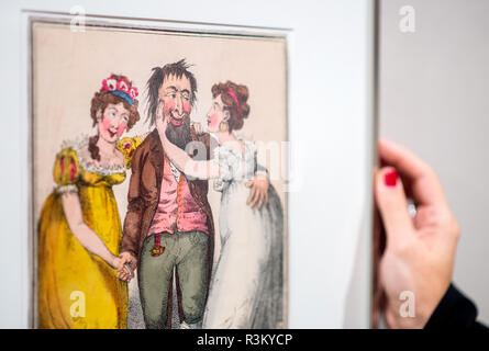 Hanovre, Allemagne. 23 Nov, 2018. Une femme regarde la caricature 'Solomon dans toute sa splendeur" par l'artiste George Cruikshank dans l'exposition 'Alles Liebe ? ! De la luxure, vices et passion'. À partir du 24 novembre 2018 au 17 février 2019 le musée sera montrant les deux nouvelles expositions 'Bernd Pfarr - Die Schönheit der wilde Auslegeware' et 'Alles Liebe ? ! De la luxure, vices et passion'. Credit : Hauke-Christian Dittrich/dpa/Alamy Live News Banque D'Images