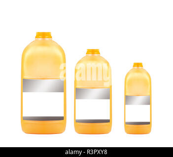 Trois bouteilles de jus d'orange isolé sur fond blanc Banque D'Images