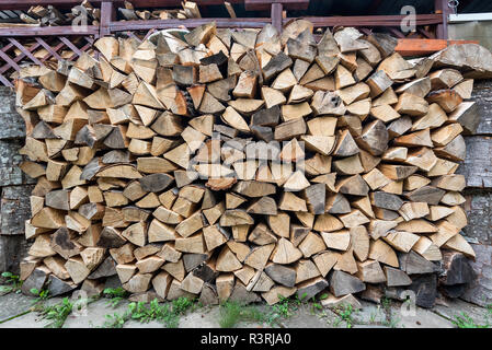 Bois de chauffage coupé à sec pour l'hiver, le bois de texture de fond mur Banque D'Images