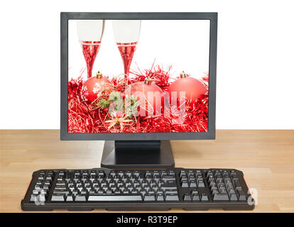 Boules rouges et des verres sur l'écran du PC de bureau Banque D'Images