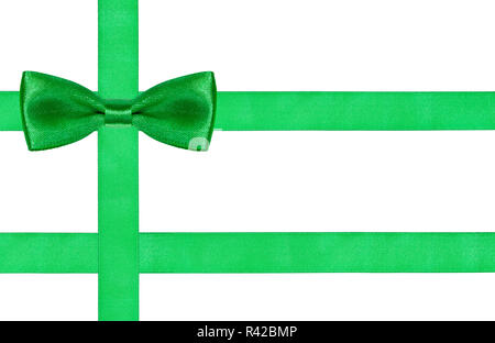 Un gros noeud papillon vert sur trois bandes satin Banque D'Images