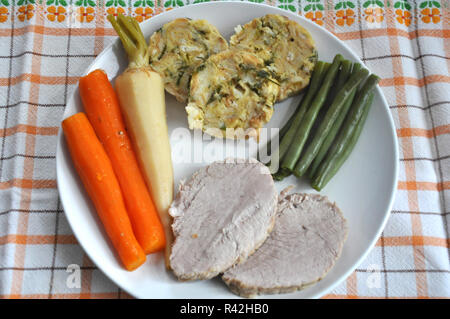 Rôti de porc avec des boulettes Banque D'Images