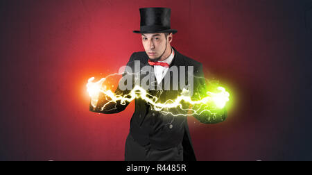 Mousseux magicien super power entre ses deux mains Banque D'Images