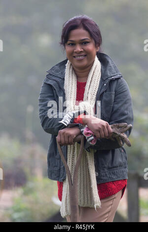 Happy woman working in her spécial Banque D'Images