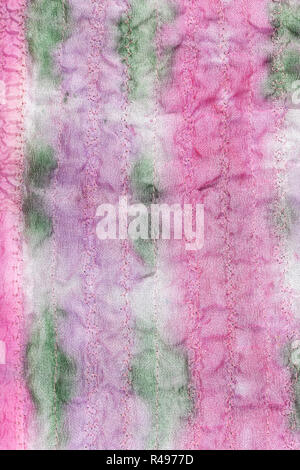 Couture peinte à la main en tissu de soie rose et vert Banque D'Images