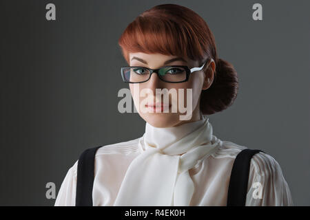 Belle jeune femme dans les verres Banque D'Images