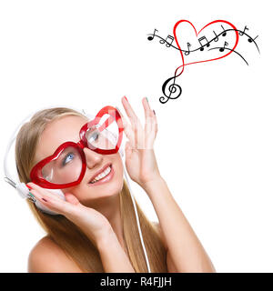 Fille dans le casque et lunettes en forme de coeur Banque D'Images