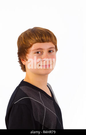 Smart happy Young boy posing in studio Banque D'Images