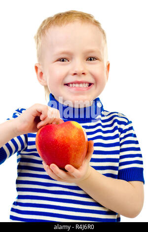 Petit garçon avec apple isolé sur fond blanc Banque D'Images