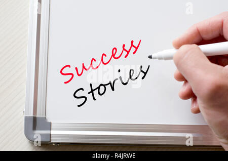 Success stories written on whiteboard Banque D'Images