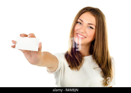 Young Girl holding carte vide isolé sur fond blanc Banque D'Images