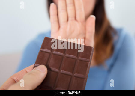 Le rejet de la femme Chocolat Banque D'Images