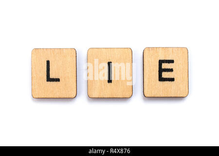 Le mot mensonge, de l'épeautre avec des lettres. Banque D'Images