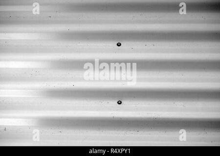 La vue de dessus et gros plan sur la tôle ondulée d'un toit en tôle ondulée. Banque D'Images