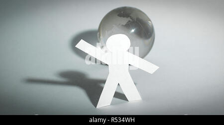 Papier élégant homme debout près de la planète Banque D'Images