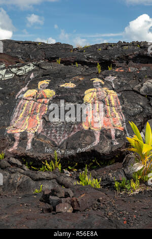 Kalapana, Hawaii - Hawaiian image représenté sur la lave avec le slogan, "nous pose à nouveau." Le dessin est sur la lave de l'éruption de 1990 qui a enseveli la plupart des Banque D'Images