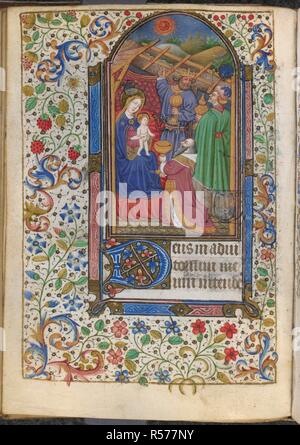 Adoration des Mages. Livre d'heures. France [Angers] ; vers 1450. [Folio] Bureau de la Vierge à Sexte.La Vierge et l'enfant, avec les trois rois portant leurs dons, l'une dirigée vers l'étoile.texte commençant par 'D' initiale décorée. Frontières de l'image réalisée à partir de décoration foliée Livre d'heures. Publié à l'origine/produit en France [Angers] ; vers 1450. . Source : Harley 5370, f.87v. Langue : le latin. Banque D'Images