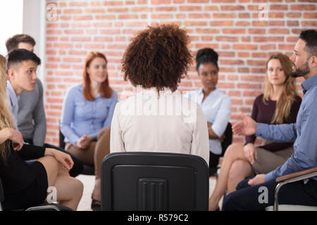 Businesspeople Sitting in Business Meeting Banque D'Images