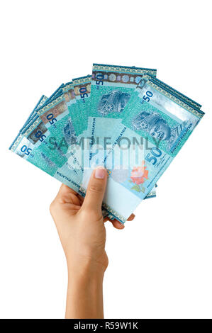 Hand holding devise ringgit de Malaisie Banque D'Images