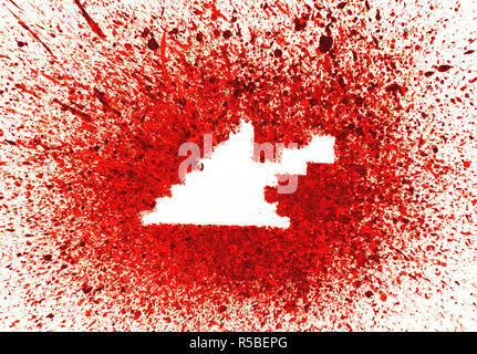 Flèche rouge sur l'ordinateur de forme d'éclaboussures Banque D'Images