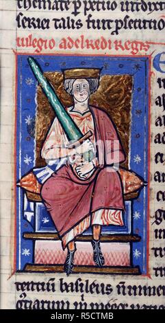 Ethelred l n'est pas prêt à l'épée. Chronique d'Abingdon. Abbaye d'Abingdon (Angleterre) ; vers 1220. (Miniature) Roi Ethelred le Pas prêt, assis, tenant une épée. Image prise à partir de la chronique d'Abingdon. Publié à l'origine/produit en Angleterre (Abbaye d'Abingdon) ; vers 1220. . Source : Cotton Claudius B. VI, f.87v. Langue : le latin et Anglo-Sax. Banque D'Images