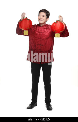 Jeune homme en costume chinois cheongsam Banque D'Images