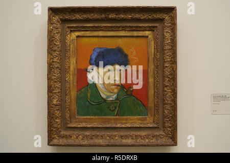 Autoportrait avec oreille bandée et tuyau. 1889. Huile sur toile. Banque D'Images