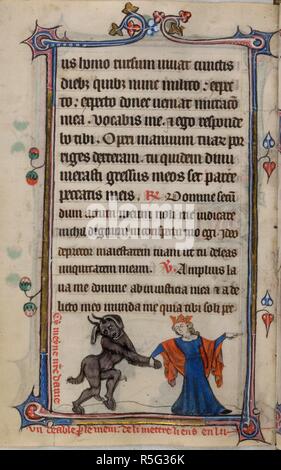 Bas-de-page scène de la Vierge Marie à la tête d'un diable par la patte et dirigée vers la droite, avec une légende de la lecture, "Cy meyne n[ost]re dame un deable p[ar] le mein de li mettre liens fr luâ€™â€™. Livre d'heures, l'utilisation de Sarum ('Le Taymouth heures'). L'Angleterre, S. E. ? (Londres ?) ; 2e trimestre du 14ème siècle. Source : Yates Thompson 13, f.172v. Langue : le latin et le français. Banque D'Images